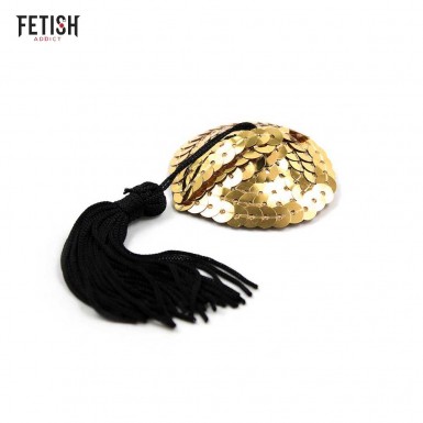 FETISH ADDICT Heart Nipple Covers - invelisuri pentru sfarcuri in forma de inima cu paiete auriu si ciucuri negre